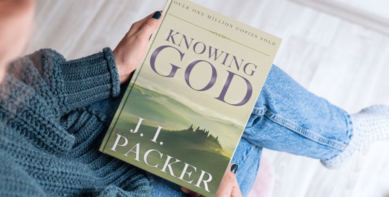 A person sitting with a book in their lap, titled "Knowing God" by J.I. Packer